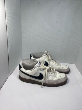Nike Men’s White Leather Sneakers with Navy Swoosh and Brown Outsole